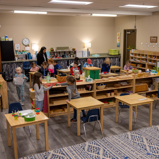Montessori classroom shelves prepared with child-height learning materials