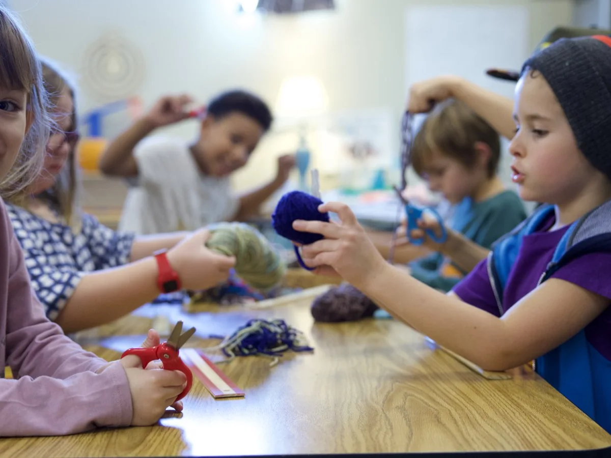 Preschool children creating together during a classroom activity