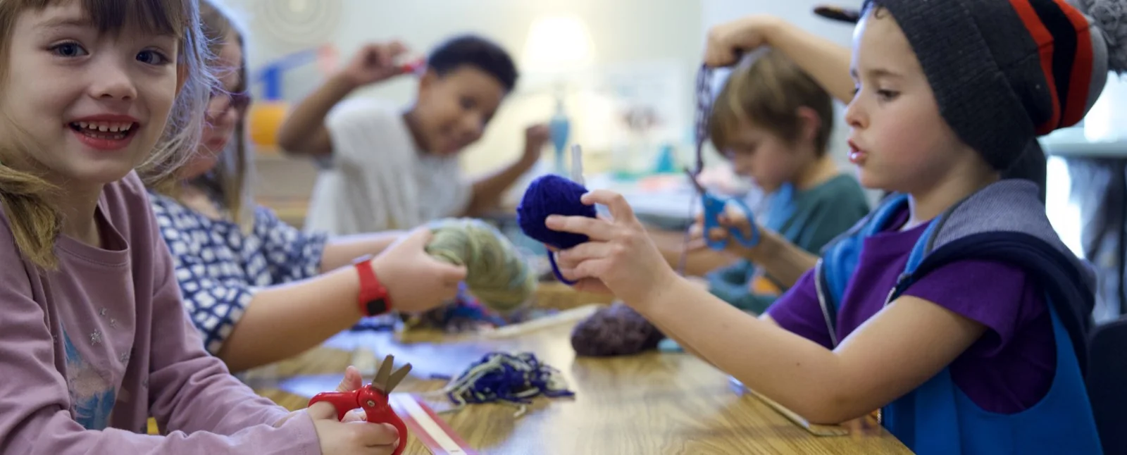 San Tan Montessori preschool children creating together during classroom work time